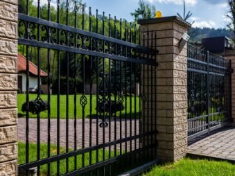 Tall metal fences with intricate patterns providing both security and aesthetic appeal in the property in Hobart TAS